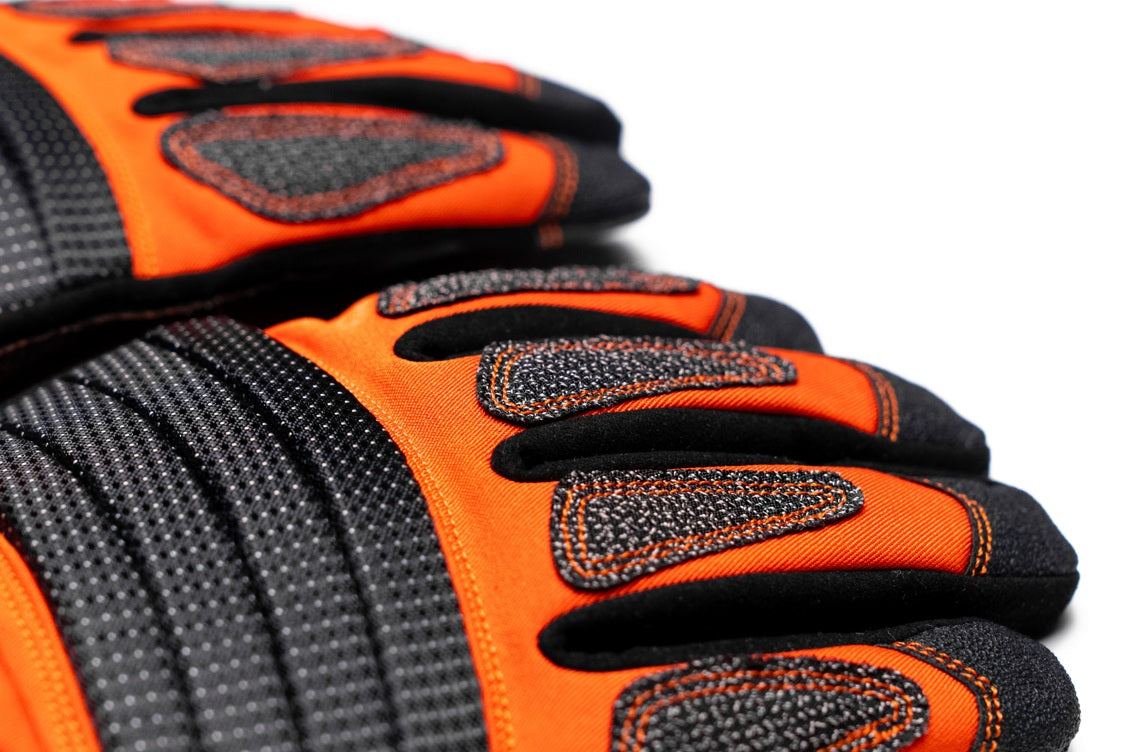 IronShield PRO Gloves, designed with impact guards, cut-resistant layers, and reinforced materials to deliver maximum safety in demanding industrial environments.